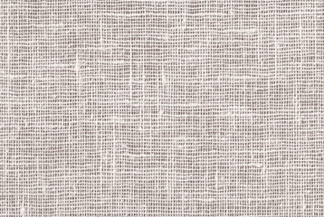 Rectangular white and beige jute hessian sackcloth material background with rough texture. Blank backdrop with copy space for text. Burlap fabric, canvas, linen to create natural rustic, rural design