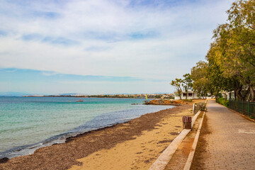 Natural green turquoise water Vouliagmeni Beach near to Voula Greece.