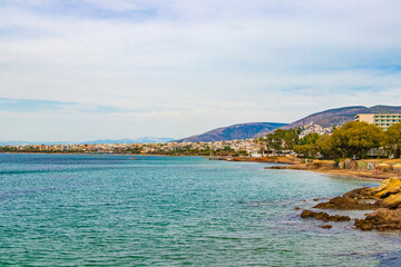 Naklejka na ściany i meble Natural green turquoise water Vouliagmeni Beach near to Voula Greece.