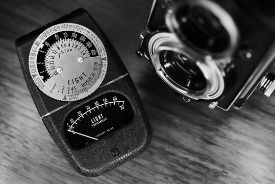 Vintage light meter and twin lens reflex film camers