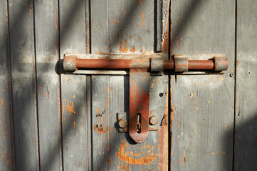 Closed Old vintage wood rusty Door with door lock