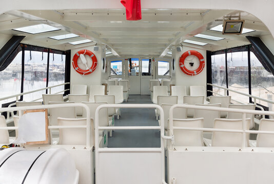 Interior empty seats inside a cruise boat