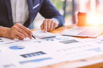 Financial planning Report ,Businessman working at office with documents on his desk, doing planning analyzing the financial report, business plan investment, finance analysis concept