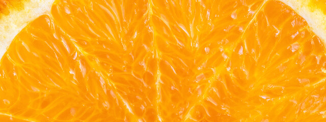 Close up of orange in section. Natural background.