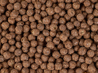 Chocolate corn cereal ball close up brown texture