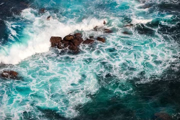 Glasschilderij Luchtfoto strand Storm op de Indische Oceaan. Luchtfoto.