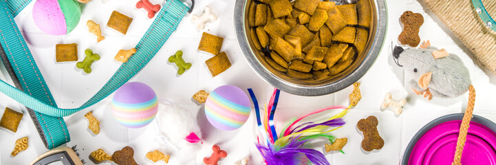 Pet food and accessories, various cat, dog, domestic animals food, toys, treats, utensils. Zoomarket and pet store, online shopping, pet care concept, flatlay banner top view copespace