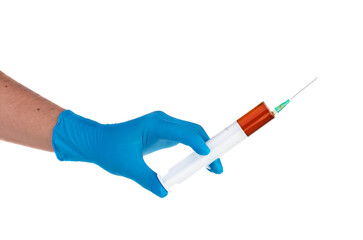 Hand of doctor or nurse in blue glove is holding syringe - vaccination concept