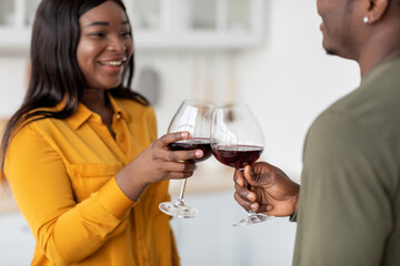 Toast For Love. Romantic African American Couple Clinking Glasses With Red Wine