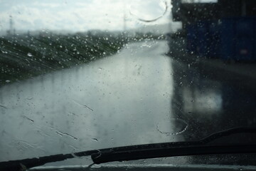 raindrops on a rainy day, wet and humid weather conditions