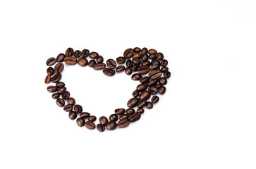 Heart background with roasted coffee beans on a white background