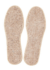 Felt insoles isolated on white background. Two warm insoles for shoes