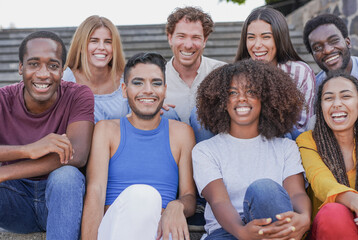Group of happy multiracial people laughing on camera outdoor - Diversity and friendship concept - obrazy, fototapety, plakaty