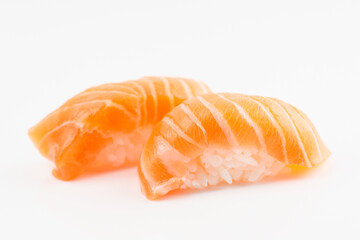 Salmon sushi shot on light background