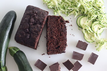 Zucchini chocolate cake slices. Moist double chocolate cake with grated zucchini, coco powder,...