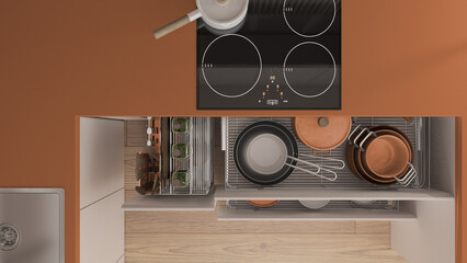 Orange and wooden kitchen close up with open drawers with plates, pots, bottles, wooden spoons and accessories. Sink, induction hob with pan. Top view, plan, above, interior design