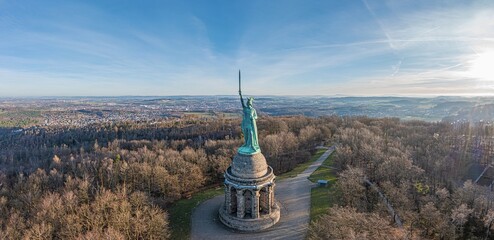 Drone image of Arminius monument in Teutoburg Forest near German city Detmold taken in morning time - obrazy, fototapety, plakaty