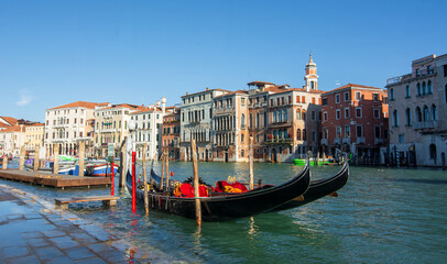 Fototapeta na wymiar The Gondola moored on the Grand Canal in Venice