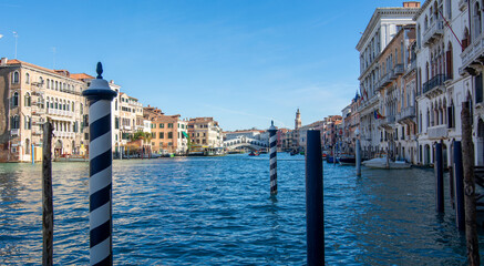 Grand Canal with the Rialto Bridge in the background between the districts of San Marco and San Polo
