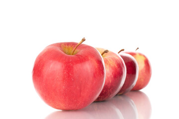 Fototapeta na wymiar Several ripe red apples, macro, isolated on a white background.