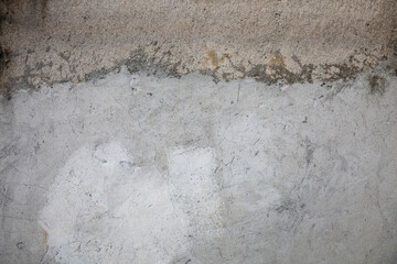 Zagreb, Croatia - February 2021. Texture of an old cracked dilapidated worn wall with stains as a backdrop
