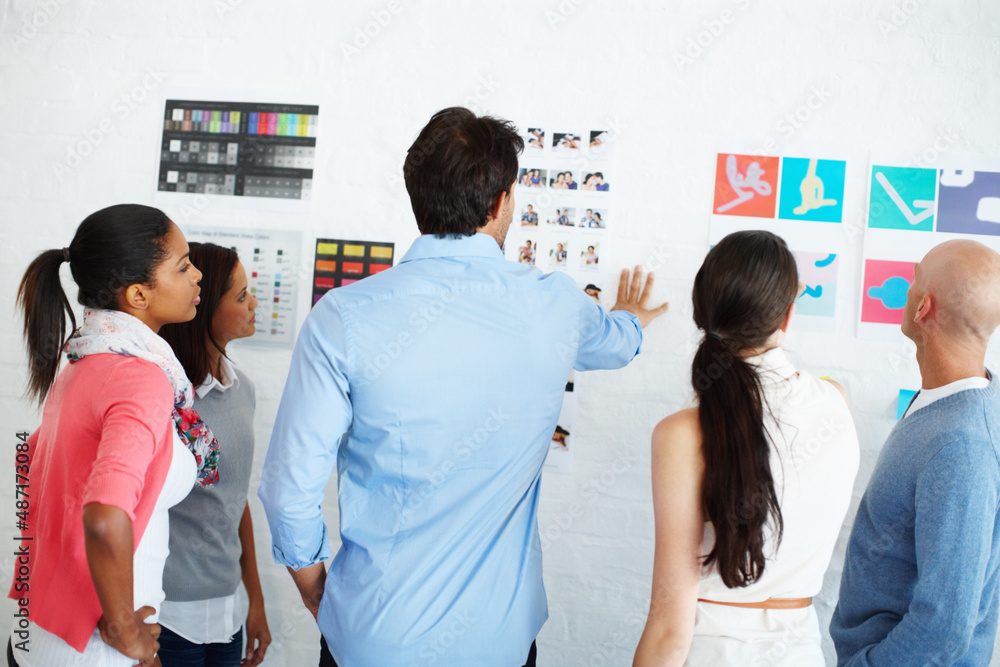 Poster theres no better work than teamwork. shot of a group of casually dressed businesspeople in the offic