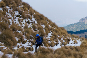 A Adult hiker winter mountaineering