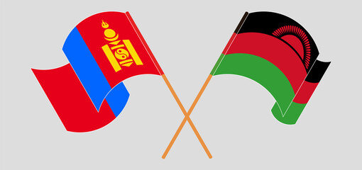 Crossed and waving flags of Mongolia and Malawi