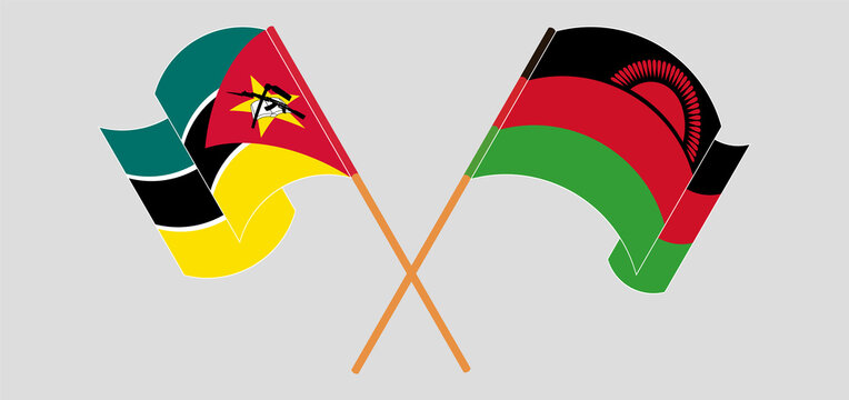 Crossed and waving flags of Mozambique and Malawi