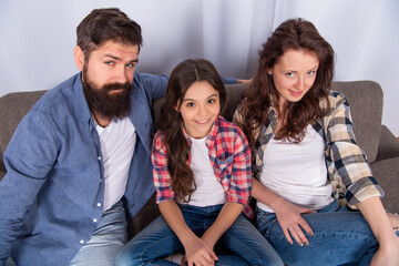 happy family portrait sit on sofa at home, family day