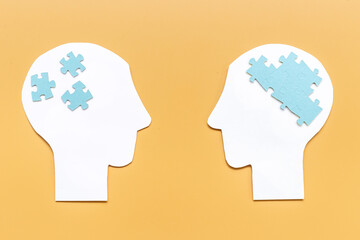 Social communication and connection concept with two paper human heads