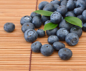 fresh blueberries on bamboo mat