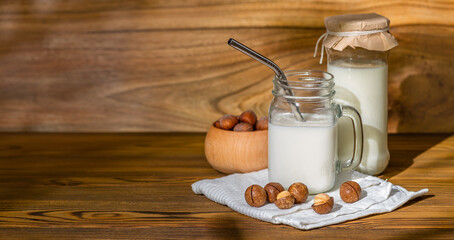 Lactose-free free-dairy macadamia products, mock-up. Bottles with milk, cheese, sour cream, butter...