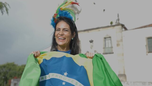 Beautiful fun of the Brazilian soccer team celebrating in the street. Dressed in the colors of Brazil.
