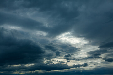 Naklejka na ściany i meble Dark and gray clouds . Hurricane cloudscape