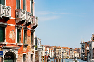 Fototapeta na wymiar Building's balconies with The Grand Canalin the background, Venice, Italy