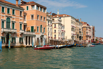 Fototapeta na wymiar Buildings, boats, and gondolas in The Grand Canal, Venice, Italy