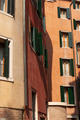 Fototapeta na wymiar Building with open windows, Venice, Italy