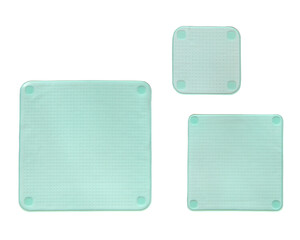 Three different sized silicone square stretch lids insulated on white background