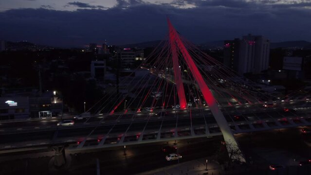 evening flying clockwise around Matute Remus Bridge in Guadalajara Mexico