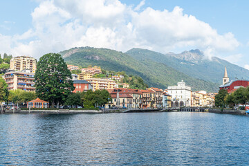 The beautiful Omegna, with splendid buildings that are reflected on Lake Orta