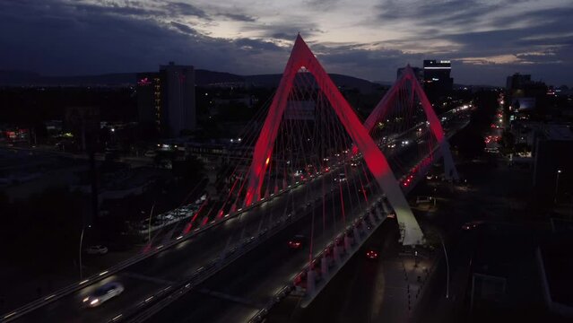 evening flying alongside Matute Remus Bridge in Guadalajara Mexico