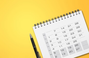 Blank 2022 desk calendar on yellow background.