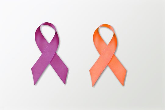 February awareness month campaign with purple and orange ribbon on background