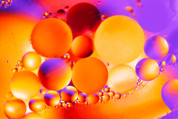 Fototapeta na wymiar Abstract multicolored macro background from liquid bubbles.