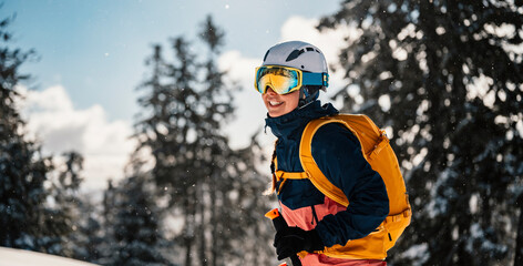 Mountaineer backcountry ski walking ski woman alpinist in the mountains. Ski touring in alpine...