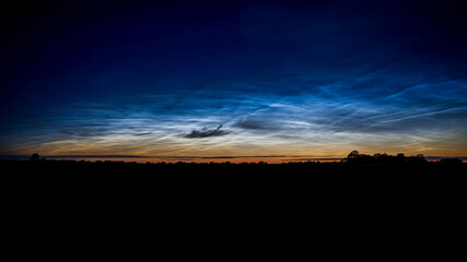 Luminous night clouds in the night sky