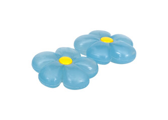 Two blue plastic flowers isolated on white background for conceptual compositions. Design element with clipping path