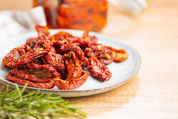 Sun dried tomatoes on plate.