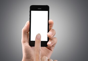 Human hand using smartphone with a blank screen